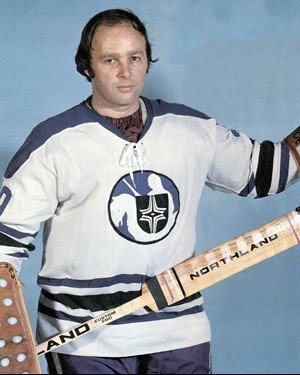 gerry cheevers pose with stick